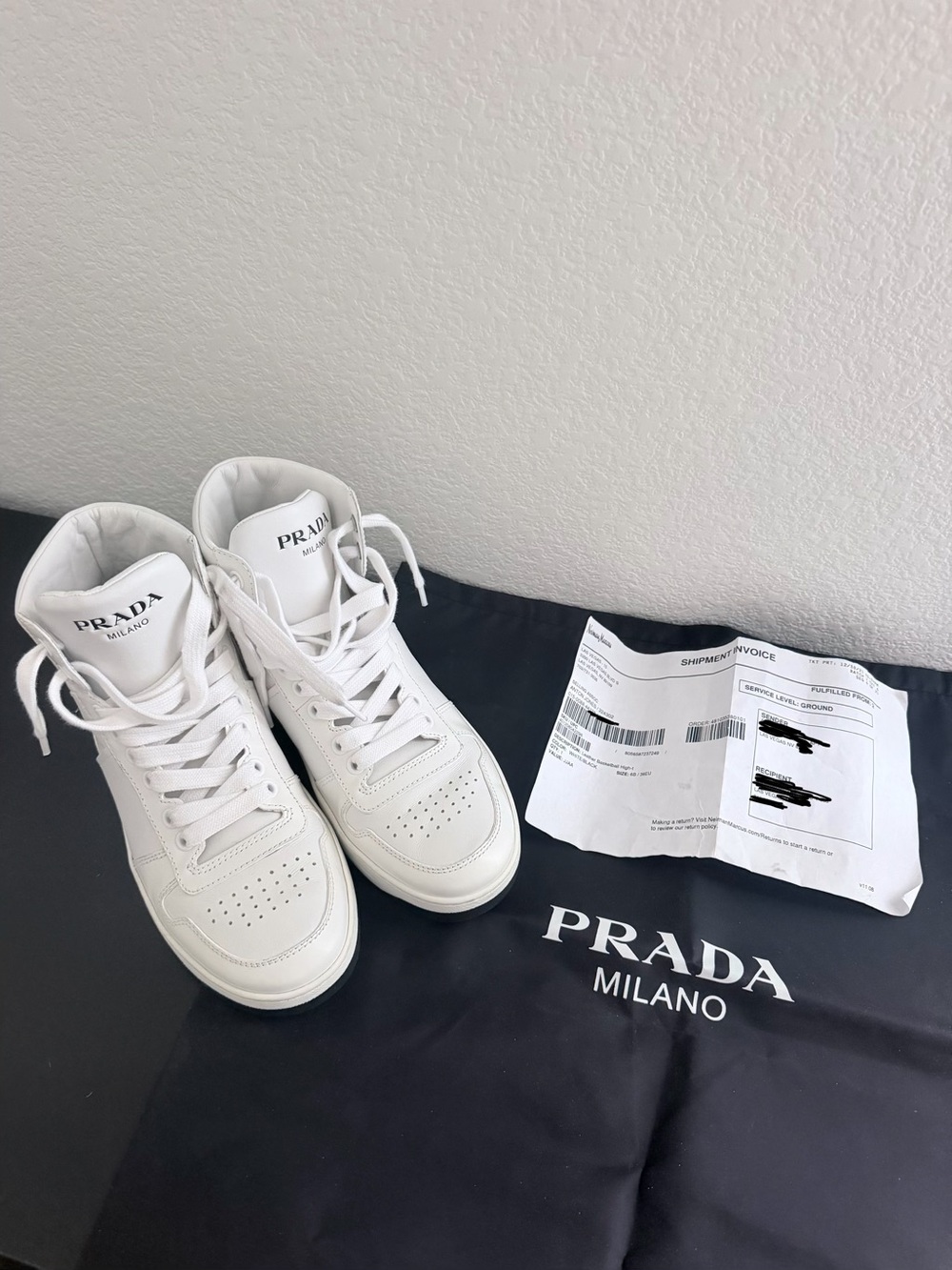 Prada White Leather High-Top Sneakers with Black Sole